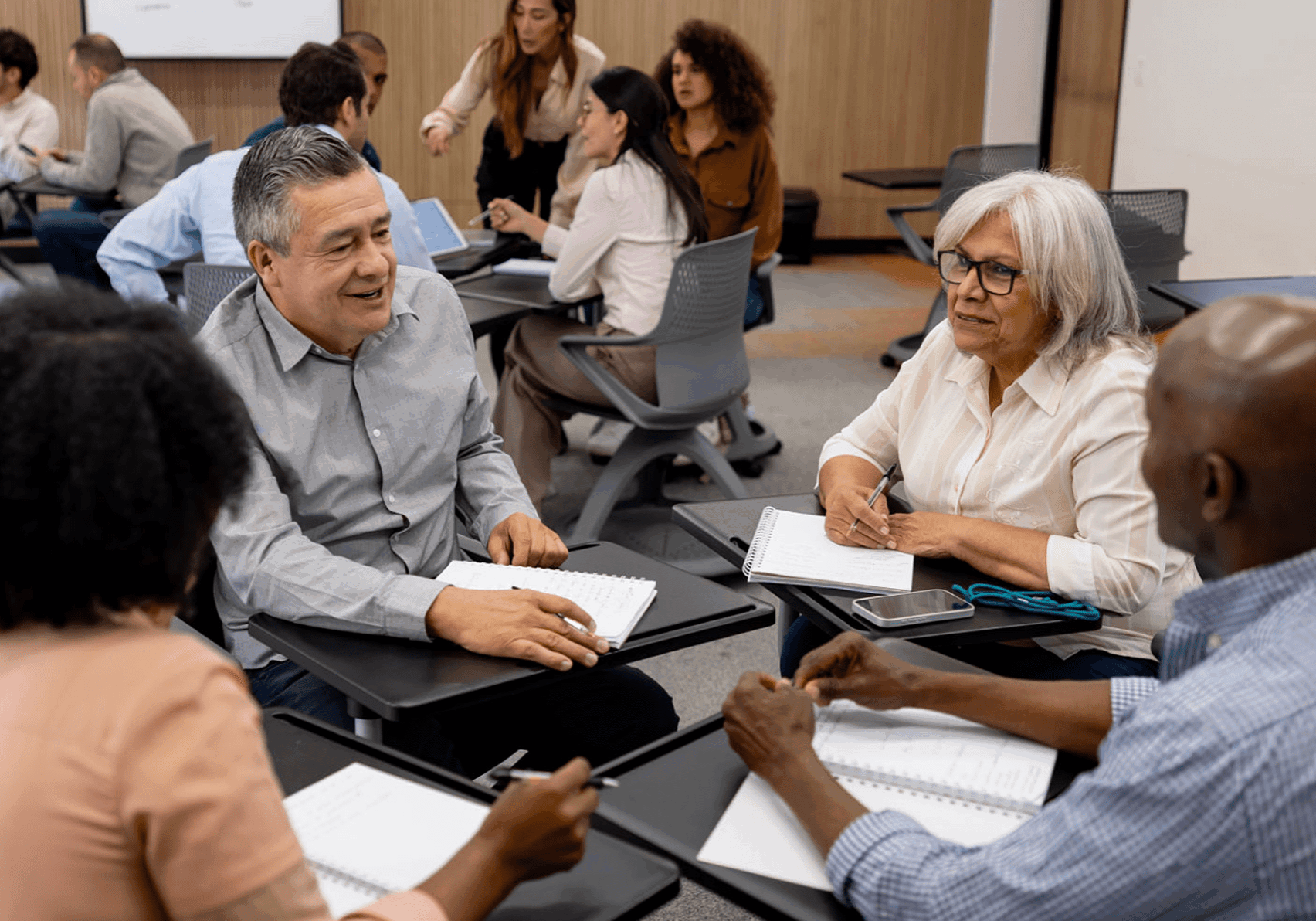 Diverse colleagues engaged in conversation